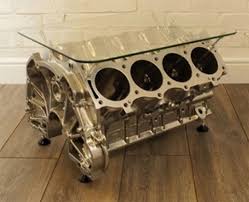 It is possible to have a coffee table out of a car tire, a neon wall art made with a car bumper, or a vw indoor hammock. Reestore Evolutionary Design Our Product Range Engine Coffee Table Car Part Furniture Automotive Decor