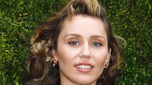 The latest miley cyrus stuns in bold outfit news, videos & comments