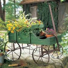 Sprinkler pots, grow bags and other garden containers great for a small yard, patio or balcony are on sale in time for spring planting. Winston Brands Amish Wagon Garden Plant Support Reviews Wayfair In 2021 Garden Wagon Wagon Planter Backyard Planters