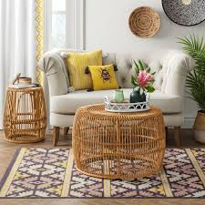 It serves as a storage space, a coffee table, and sometimes, a footstool. Pyronia Rattan Cage Accent Table Natural Opalhouse Cage Coffee Table Cage Accent Table Wicker Coffee Table