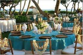 I created a simple coastal centerpiece with cheap bottles and simple shells on a tray. Sumply Beautiful Hawaiian Party Theme Luau Wedding Hawaiian Wedding