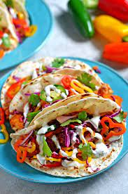 He's mixing a customized spice rub to use on grilled mahi mahi and balancing. Chipotle Pineapple Fish Tacos With Rainbow Pepper Slaw Host The Toast Pineapple Fish Stuffed Peppers Fish Tacos Recipe