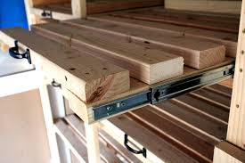 Last, i just had to install some gate handles for each shelf to be able i took the pictures below of the completed diy garage storage shelves: Sliding Storage Shelves How To Make Diy Garage Storage Shelves