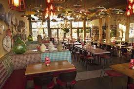 View the nando's menu and choose to dine in, order online or get it delivered. Nando S Restaurant By B3 Designers Nando S Restaurant Cafe Design Restaurant Design