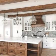 A leaf patterned wallpaper adds interest to a charming kitchen design by young huh interiors. Sara Langer Saralanger Profile Pinterest