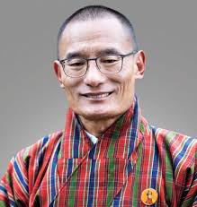 17. 𝐒𝐢𝐥𝐞𝐧𝐭 𝐇𝐞𝐫𝐨𝐞𝐬 Mr. Tashi Tobgye. He doesn't smile much and  when he does, it is with his mouth closed lest doma particles fly out. He  is a jolly good fellow who