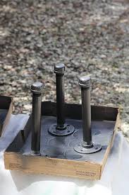 On this shelf, an 18″ pipe went into each flange at the bottom, and then at the top a tee. Diy Industrial Pipe Shelves Full Tutorial