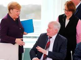 The giant mosaic shows merkel's hands composed of smaller photographs of hands. Minister Refuses To Shake Angela Merkel S Hand Times Of India