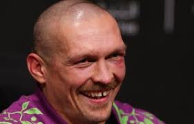 Tyson Fury turns up to Jake Paul vs Tommy Fury weigh-in wearing head scarf  after enjoying dinner with boxing legend Mike Tyson in Saudi Arabia ahead  of fight