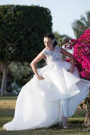 If you're feeling bolder, dresses in colors like pink, lavender, and blue are beautiful with floral details. Girl Bride With Adorable Face In Beautiful Wedding Bridal White Stock Photo Picture And Royalty Free Image Image 84371046