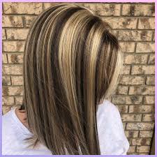 Style your hair with high contrasting platinum highlights that can make you look even more sense with a dark hair. 90s Chunky Highlights Are The Hair Trend That S Back In Fashion Glamour Uk