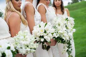 Plant a bulb in fall and even a novice gardener can expect to see a beautiful flower come spring. Classic White Tulip Calla Lily Bouquets