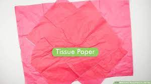 Smooth the whipped piece of paper in a downward motion with your other hand. How To Put Tissue Paper In A Gift Bag 15 Steps With Pictures