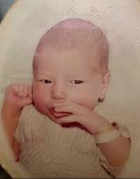 Here's my son's cherished baby picture from 1974, a heartwarming reminder  of his innocent beginnings. Although his sudden passing in 2021 has left an  unfillable void, his memory lives