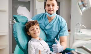 When should I schedule my child's first visit to the dentist?