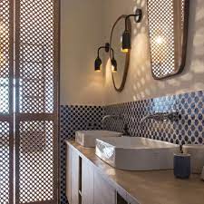 The backsplash is usually something we plan for the kitchen, often overlooking the fact that the bathroom needs one too. 10 Stylish Bathroom Backsplashes
