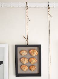 Position the cut and drilled picture rail against the wall with the top edge. Two Novel Ideas For Hanging Art One Kings Lane