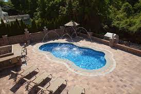 Since installing any kind of paver requires excavating the soil and laying a base, it's important to contact the local utility luckily, most of the time, pavers only require basic maintenance to look their best. Deciding On Concrete Pavers For Your Pool Patio Installation Project In Millis Ma Wenzel Inc