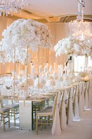 Wedding reception flowers tall vases. Tall Flower Arrangements To Inspire Your Reception Centerpieces