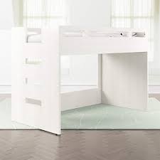 A ladder has wide grooved rungs. Abridged White Glaze Low Twin Loft Bed Crate And Barrel