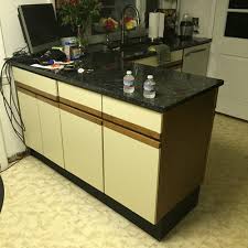 new cabinet doors give an old kitchen a