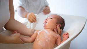 Why One Hospital Is Implementing Newborn Swaddle Baths Are They Right For Your Baby