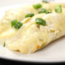 Sour cream and cream of chicken soup make a tasty sauce for these cheesy chicken enchiladas. Sour Cream Chicken Enchiladas Cooking Panda