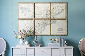 A mirror above is a great way to add depth and interest while adding books will create an illusion of height. How To Hang Art Above A Console Table