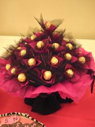 Candy bouquets are a fun gift to give or receive, but they can be expensive to buy! Pink And Black Chocolate Bouquet Chocolate Bouquet Chocolate Flowers Bouquet Candy Bouquet