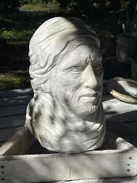 Carving skull from jasper.