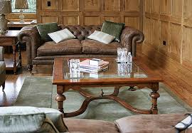 For more compact spaces, choose from our range of stylish nests of tables. Large Square Glass Top Coffee Table In Oak Panelled Room