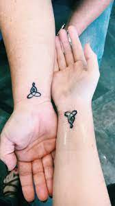 Matching Mother Daughter Tattoos Symbol Is Celtic Knot Representing Bond Between Mother And Child Tattoos For Daughters Tattoo For Son Mother Son Tattoos