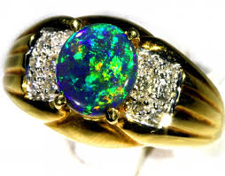 Gold is a chemical element with the symbol au and atomic number 79, making it one of the higher atomic number elements that occur naturally. Black Opal Ring Size 7 5 18 K Gold Ck 263