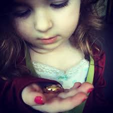 Still one of my favorite pictures of Rosie. Hope it fits her next year. She  loved wearing it.