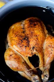Place celery, carrots, onion, and thyme sprigs in the bottom of an electric pressure cooker. Ninja Foodi Roast Chicken The Salty Pot