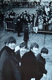 Trash covers a tarmac on Aug. 21, 1964, after the Beatles arrived at San Francisco International Airport to thousands of fans. (Getty Images)”; from a recent article in the Washington *Post* about