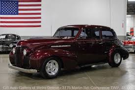 Image result for Trojan Maroon 1939 Oldsmobile