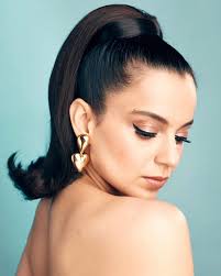 Kangana (@kanganaranaut) giving Barbiecore in our Unbreak My Heart Earrings  💕 Shop the look at www.shopanatina.com . . . #shopanatina #anatina  #kanganaranaut #goldplatedjewelry #heartearrings #statementearrings #shopnow