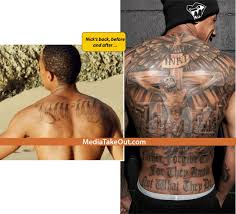 He even wears it on his body. Look At All The Crazy Tattoos That Nick Cannon Put On His Back Just To Cover Up That Stupid Mariah Carey Tat Weird Tattoos Nick Cannon Mariah