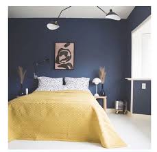 Adding a yellow tone in a kid or teen bedroom that has a lot of navy blue color is a terrific idea. Pin By Arna Geirsdottir On Svefnherbergi Blue Bedroom Decor Yellow Bedroom Walls Yellow Bedroom