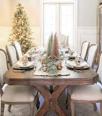 Garland draped down the table acts as a runner. Vintage Christmas Table Setting Sanctuary Home Decor
