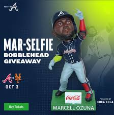 Ozuna was charged with aggravated assault strangulation and misdemeanor family violence, according to jail records. Marcell Ozuna Bobblehead Braves