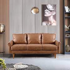 A 50% down and 50% blown poly blend is wrapped around the core and is put into a channelled down proof tick. Betty Lou 74 01 Wide Faux Leather Square Arm Sofa Wayfair Havenly