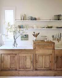 Warm, rich and perfectly coordinated with clean, white kitchen aesthetics, walnut is another wood that's popping up in more modern kitchen cabinet designs. Wood Cabinets In The Kitchen Making A Comeback Town Country Living