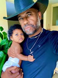 A handsome grandpa with his grandson