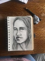 Charcoal portrait. Beautifully custom framed in rich mahogany with ornate  textured edges. Signed by the Parisian street artist. 23.75 x 16.75. $75  firm.