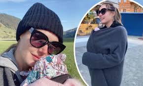 Tamara Ecclestone cradles her daughter Serena as she enjoys country outing  with husband Jay Rutland