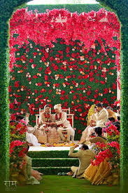Photo Of Floral Wall Unique Mandap In Red And Green Wedding Backdrop Decorations Wedding Stage Decorations Diy Wedding Decorations
