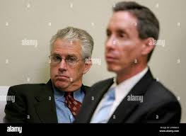 James Bradshaw, an attorney for a cousin who was married to the accuser,  looks at Warren Jeffs, right, during Jeffs' trial Wednesday, Sept. 19,  2007, in St. George, Utah. Jeffs, head of