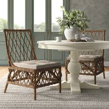 Beautifully made from oak wood, this traditional chair features a handsomely finished frame with a stylish cross back and delicately curved supports. Leatrice Cross Back Side Chair Reviews Birch Lane